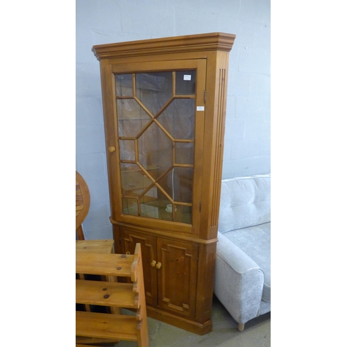 1704 - A pine corner cabinet