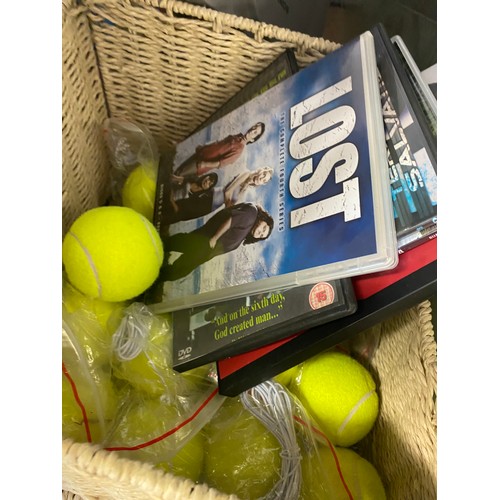 2223f - Sony PS1/Playstation 1 and approximately fifty mixed games and DVD's, plus 15 tennis balls