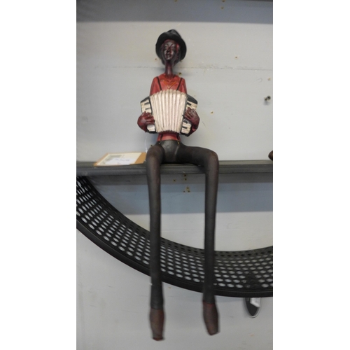 1316 - A sitting jazz band squeeze box player H 40cms (026312)   #