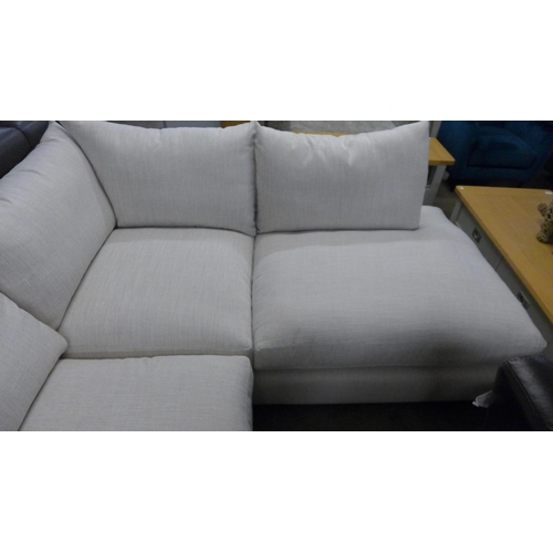 1398 - A linen upholstered RHF corner sofa