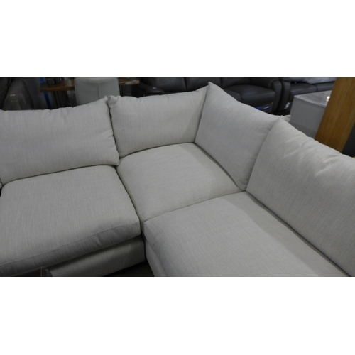 1398 - A linen upholstered RHF corner sofa