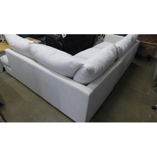 1398 - A linen upholstered RHF corner sofa