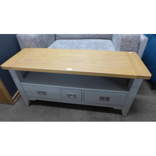 1415 - A Harbour grey painted and oak three drawer TV unit