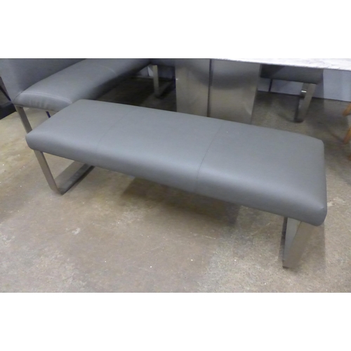 1477 - A Saturn fixed top marble effect and chrome dining table with a grey leather effect bench set