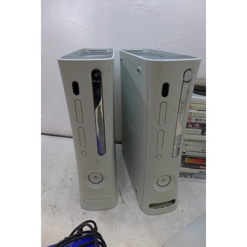 2198 - Two Xbox 360 consoles with leads, controllers and games