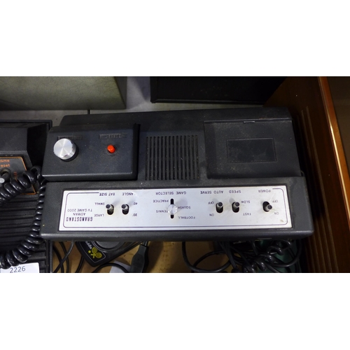 2226 - Atari 2600 Woody vintage gaming console with 7 games and vintage Grandstand game - both W with joyst... 