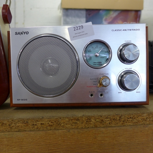 2229 - Vintage style Cooper radio W and a Sanyo radio