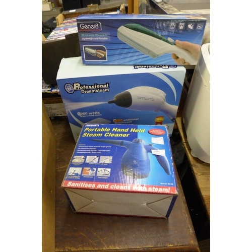 2115 - Three portable/handheld steamers, boxed