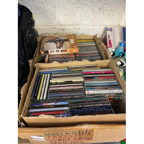 2178 - Box of approximately 80 CD's (Rock and Pop) with approximately forty DVD's and box sets