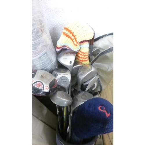 2263 - Approx. 20 golf clubs (irons) in two golf bags with small qty. of accessories