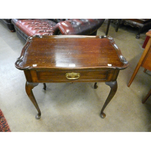 20 - A George II style mahogany single drawer silver table