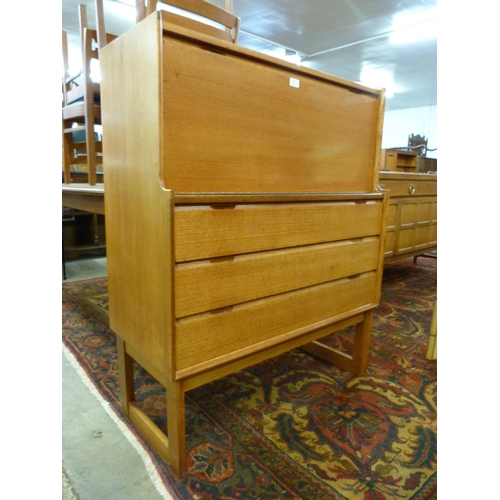 51 - A Turnidge of London teak writing cabinet