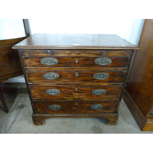 112 - A George III mahogany bachelor's chest of drawers