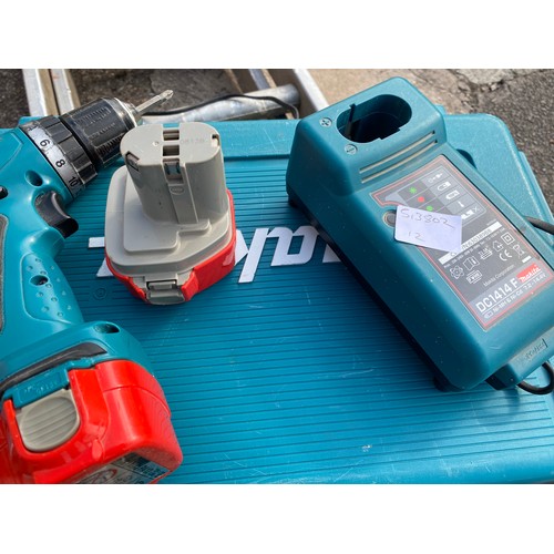 2001 - Makita 12V cordless drill with two batteries and charger - W