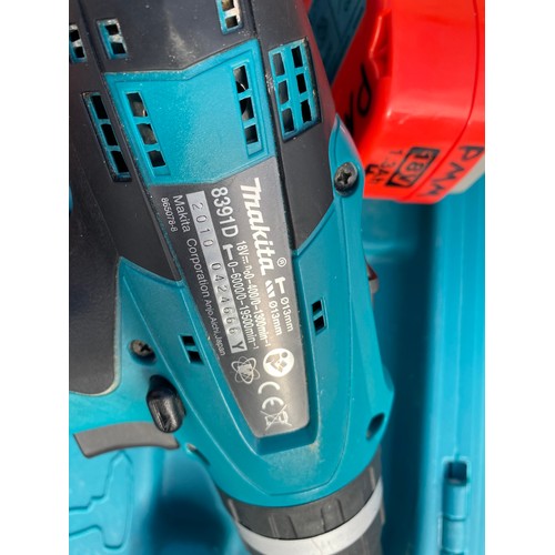 2002 - Makita 18V cordless drill (8391D) with four batteries and charger - W