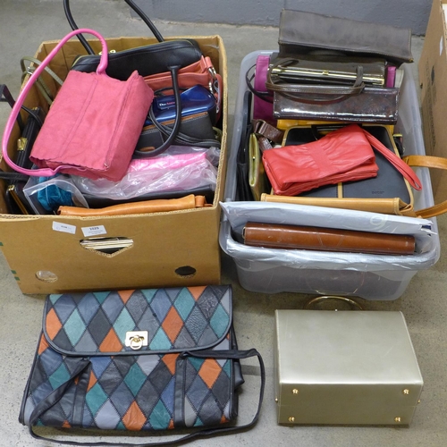 1029 - Two boxes of handbags, including vintage