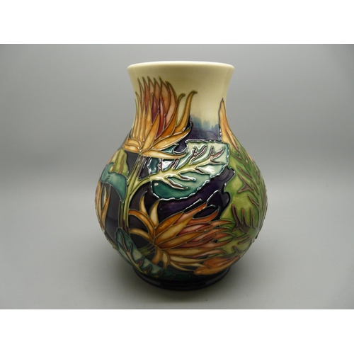 606 - A Moorcroft vase, 'Burdock' by Phil Gibson, 15.5cm