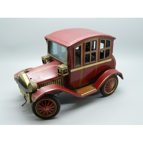 633 - A Japanese tin-plate model vehicle, marked, 'TN Toys, made in Japan', one headlight a/f