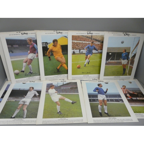 643 - A collection of twenty-four large Ty-Phoo Tea footballer cards, including George Best, Bobby Charlto... 