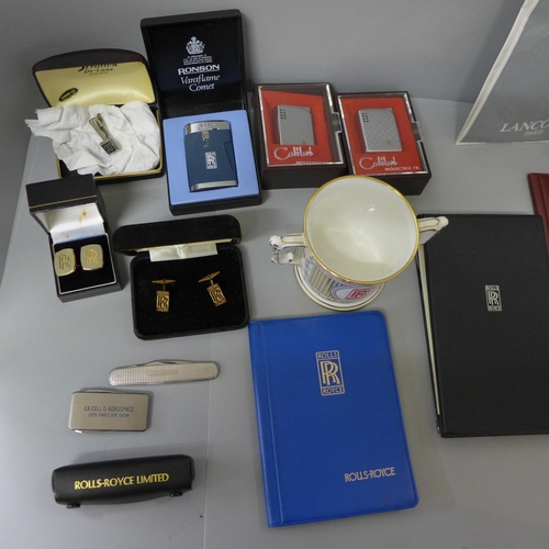 664 - A collection of Rolls-Royce memorabilia including lighters, cufflinks, ties, etc.