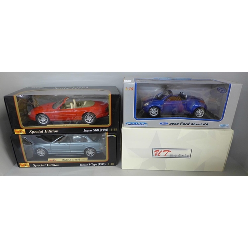 732 - Four 1:18 model cars including two Maisto, all boxed