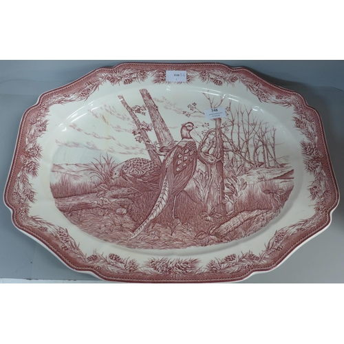 748 - A red transferware serving plate, Royal Game, Josiah Wedgewood & Sons exclusively for Williams-Sonom... 