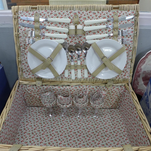 750 - A wicker picnic basket and contents