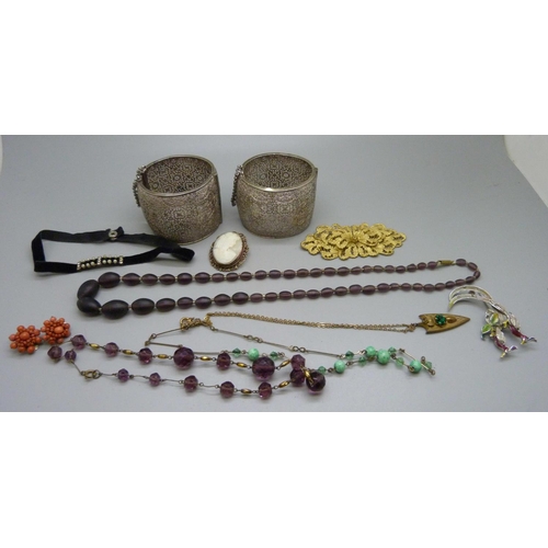 859 - Costume jewellery including coral earrings, two filigree bangles, etc.