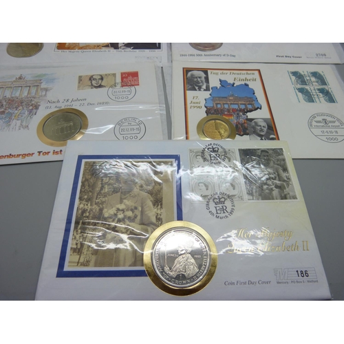 863 - Stamps;-fifteen coin covers including four £5 coins