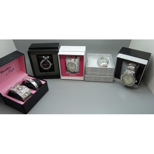 864 - Five wristwatches, boxed