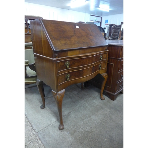 103 - A Queen Anne style walnut bureau de dame