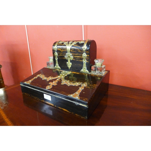 13 - A Victorian coromandel and brass mounted desk stand