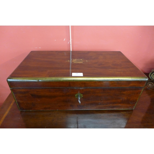 14 - A 19th Century mahogany and brass mounted campaign writing slope