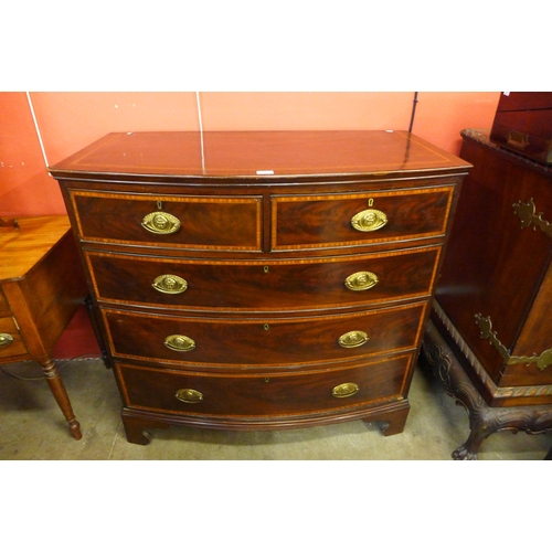 18 - A George III inlaid mahogany bow front chest of drawers