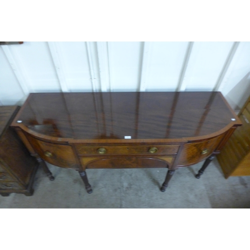 31 - A George IV inlaid mahogany breakfront sideboard