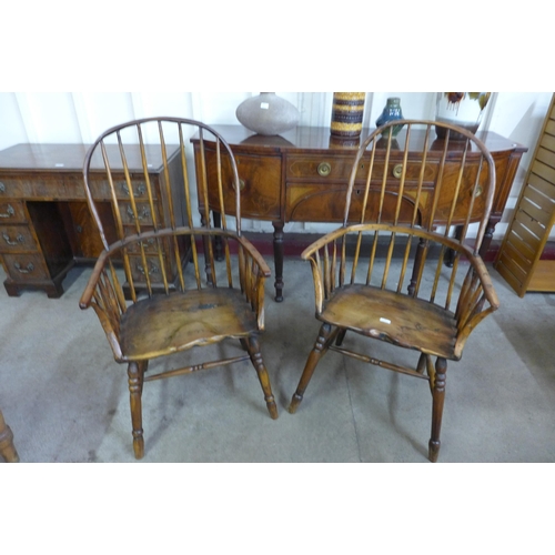 36 - A pair of primitive yew wood Windsor comb back armchairs