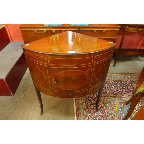 38 - A George III inlaid mahogany corner night stand