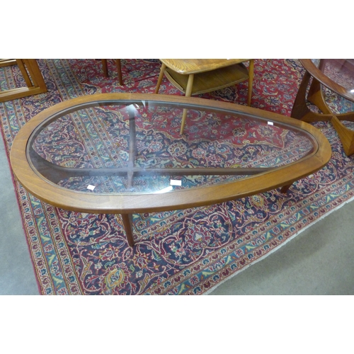 44 - A Stonehill Stateroom teak and glass topped tear drop coffee table