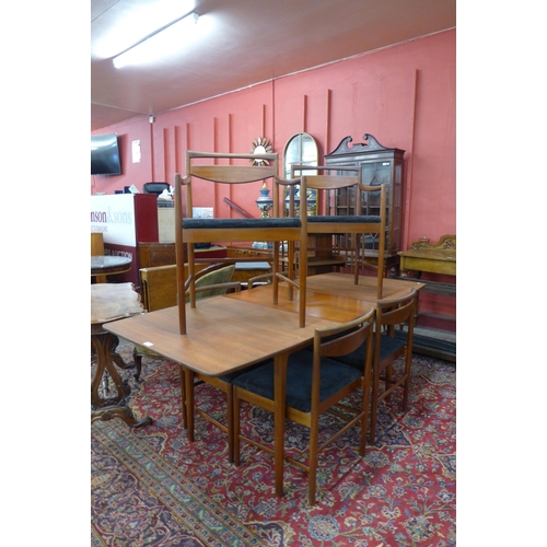 46 - A McIntosh teak T2 extending dining table and six chairs