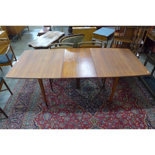 46 - A McIntosh teak T2 extending dining table and six chairs