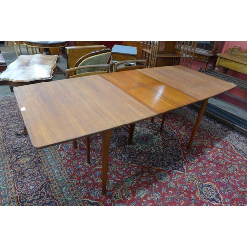 46 - A McIntosh teak T2 extending dining table and six chairs