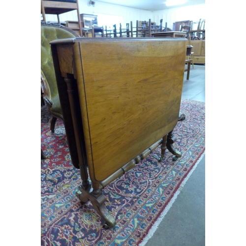 5 - A Victorian Holland & Son walnut Sutherland table