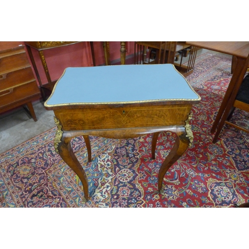 7 - A Victorian inlaid walnut and ormolu mounted lady's dressing table