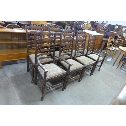 97 - A set of eight 18th Century style elm ladderback chairs