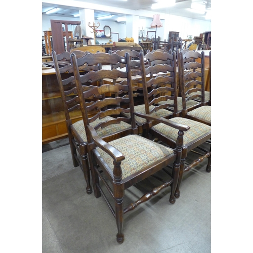 97 - A set of eight 18th Century style elm ladderback chairs