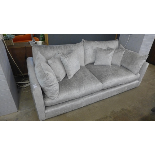 1459 - A grey crushed velvet upholstered three seater sofa