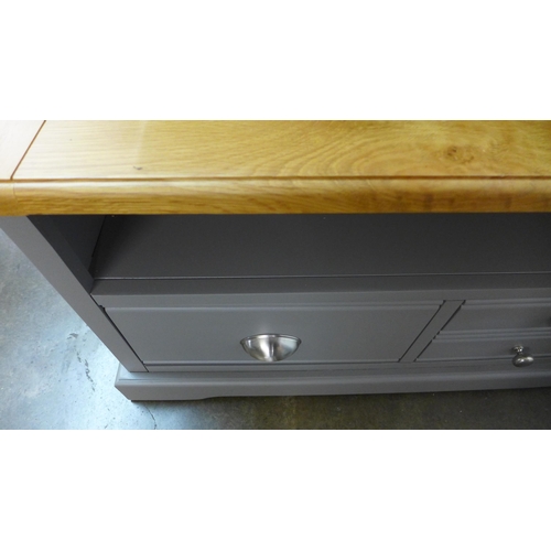 1529 - A Waterford dark grey painted and oak three drawer TV unit