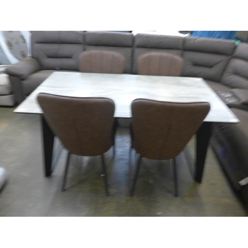 1537 - A ceramic topped dining table and four tan upholstered chairs