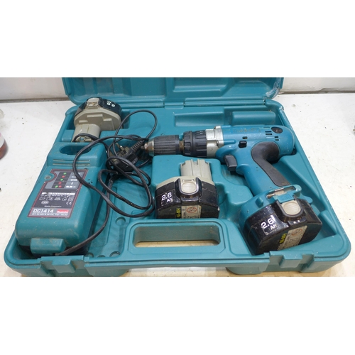 2031 - 3 Makita corded and cordless drills in cases