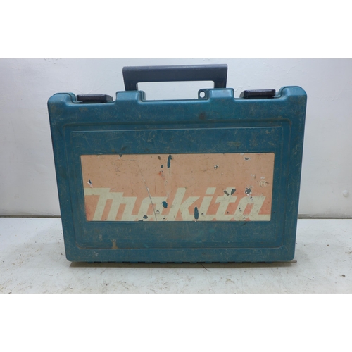 2031 - 3 Makita corded and cordless drills in cases